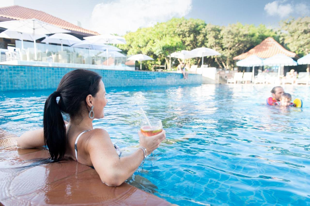 The Capital Zimbali Hotel Балито Екстериор снимка A woman relaxing at a pool